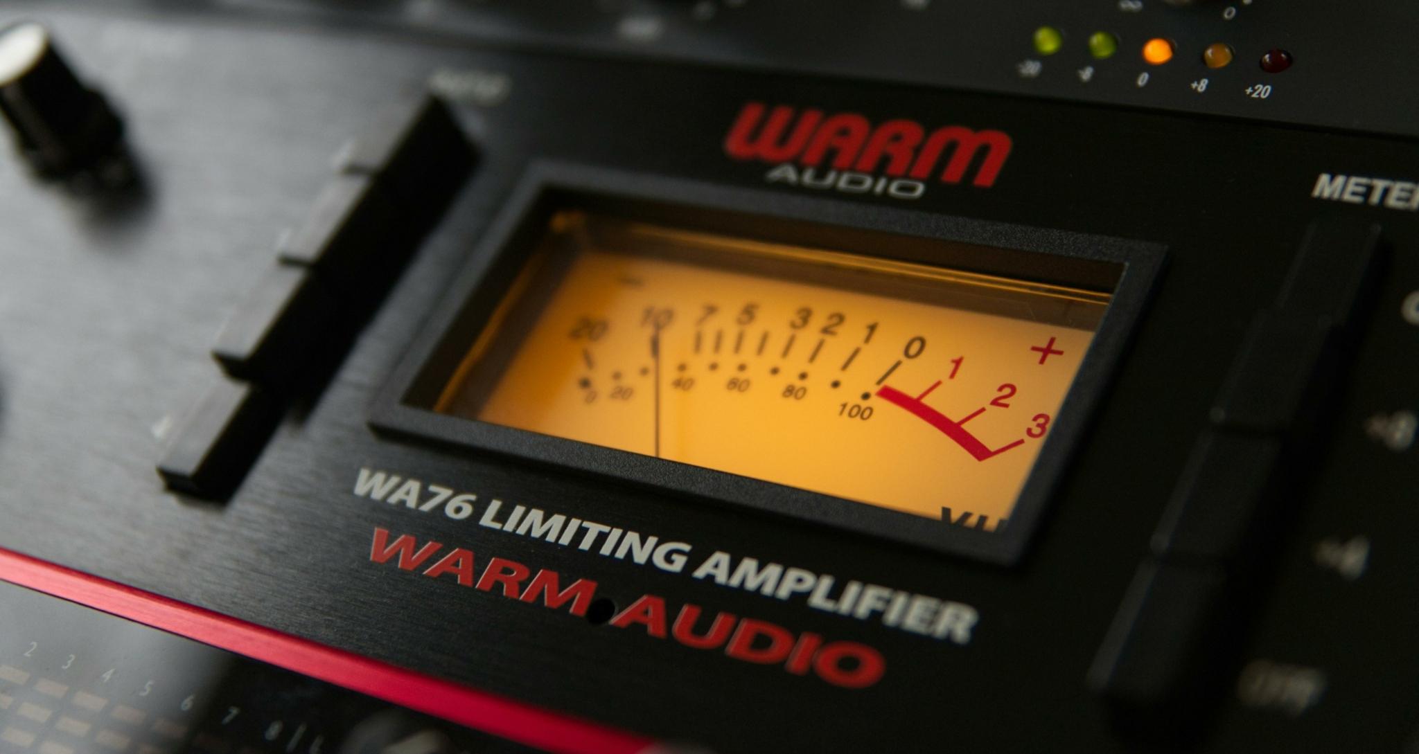 Close-up of a Warm Audio WA76 Limiting Amplifier with visible meter and controls
