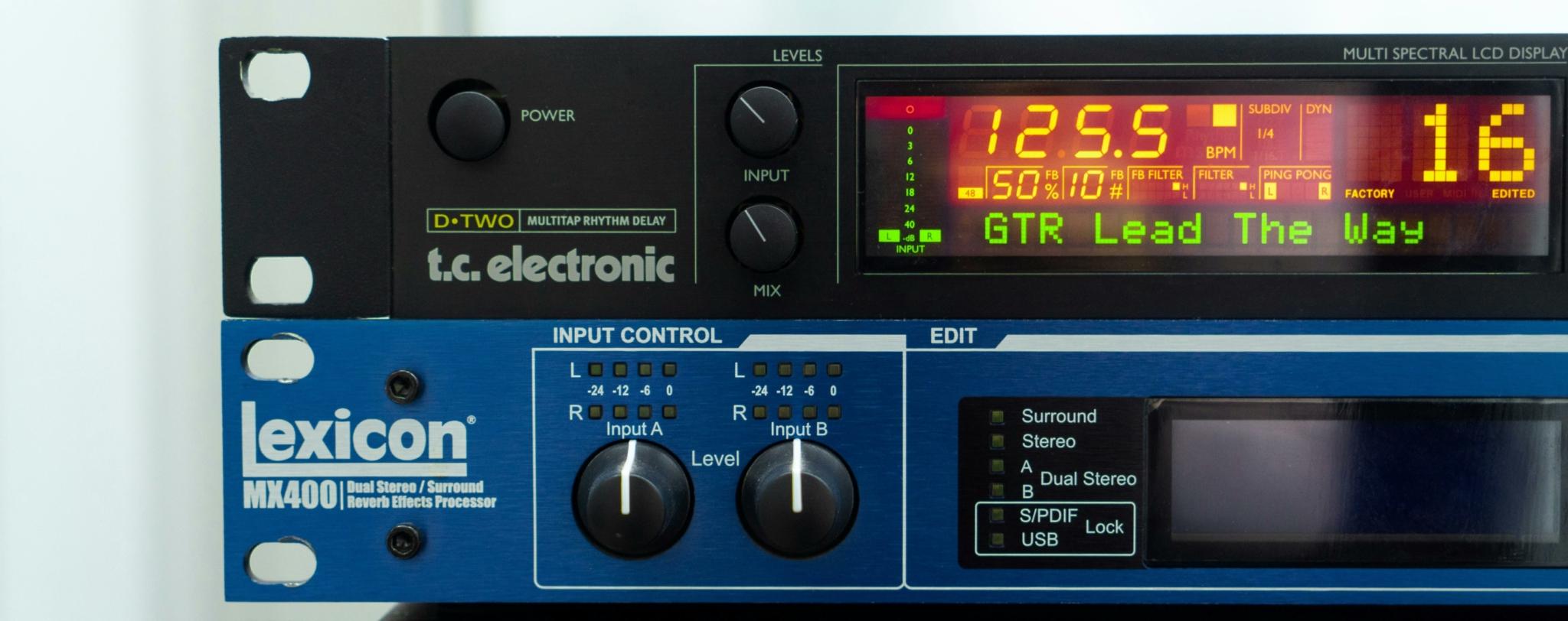Image showing audio equipment including t.c. electronic D-TWO, Lexicon MX400, and dbx 160A with visible settings.