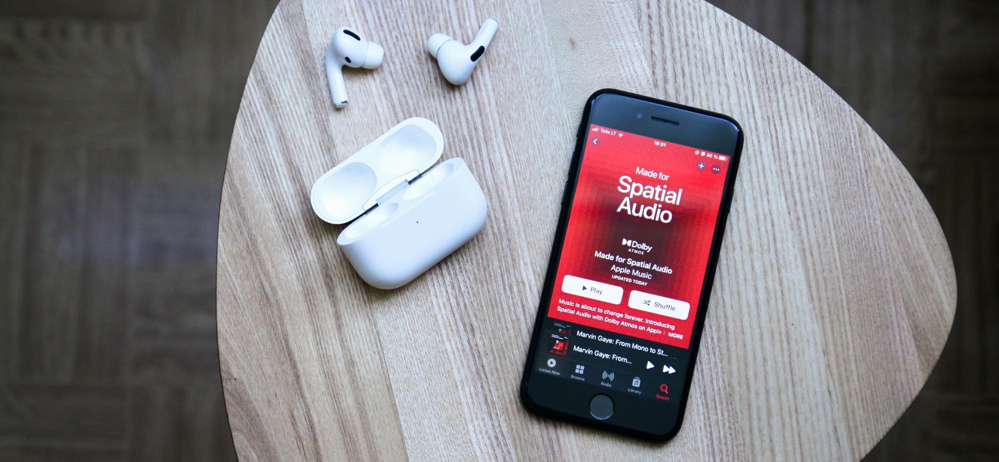 Apple AirPods and iPhone displaying Spatial Audio settings