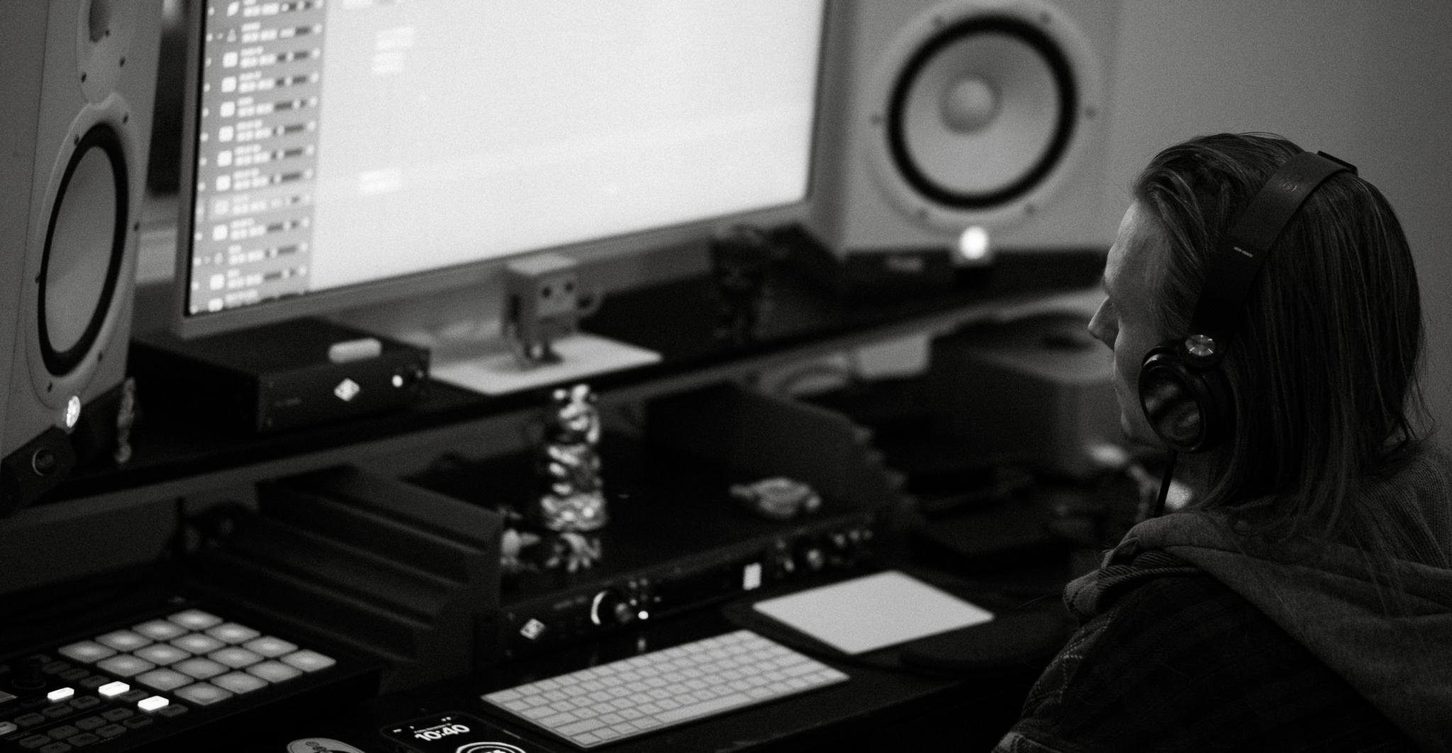 Audio recording studio with monitors and DAW setup