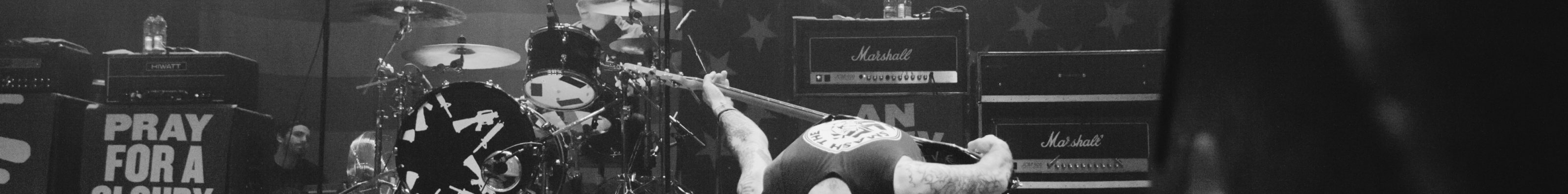 Amps and a drum kit on a stage