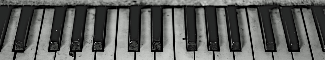 An old black & white piano