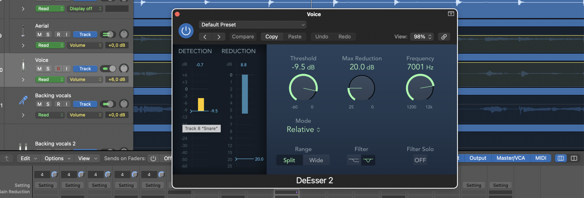 Screenshot of Logic Pro showing various audio tracks and a DeEsser plugin interface.