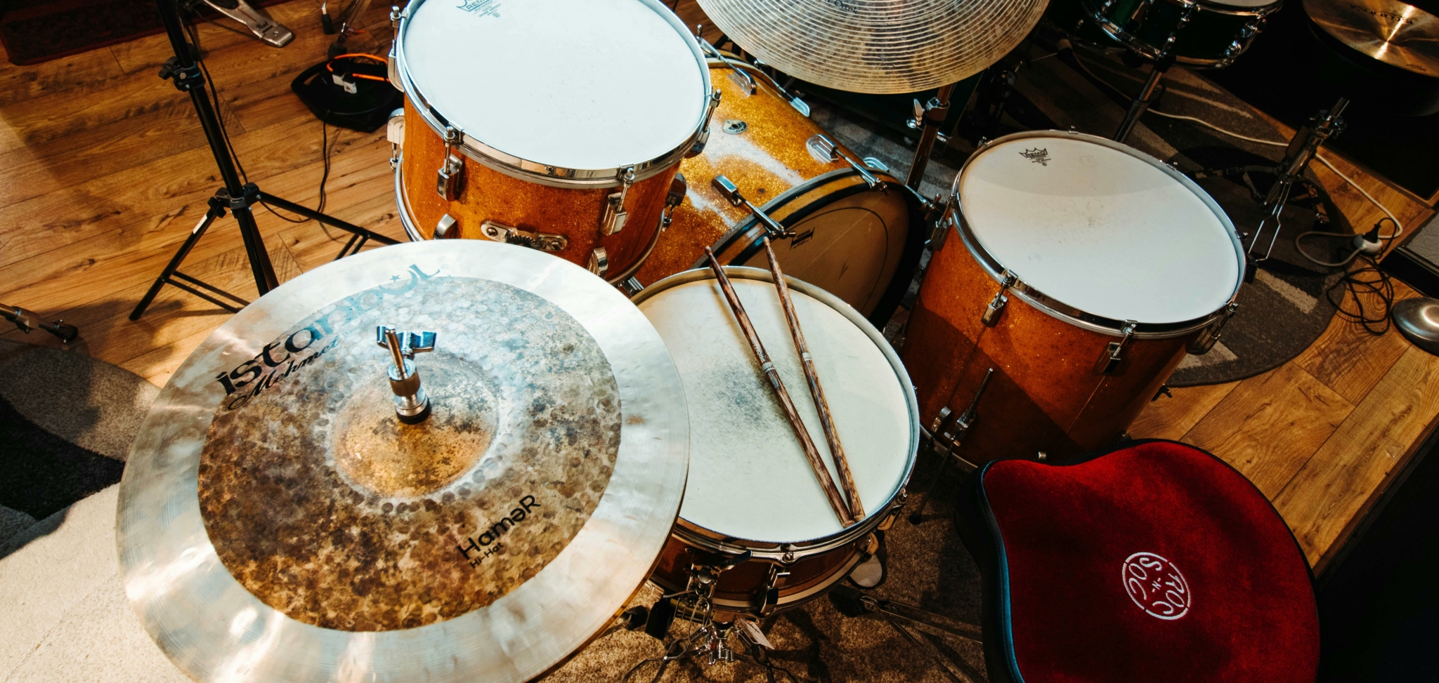 A close-up view of a drum kit featuring various components.