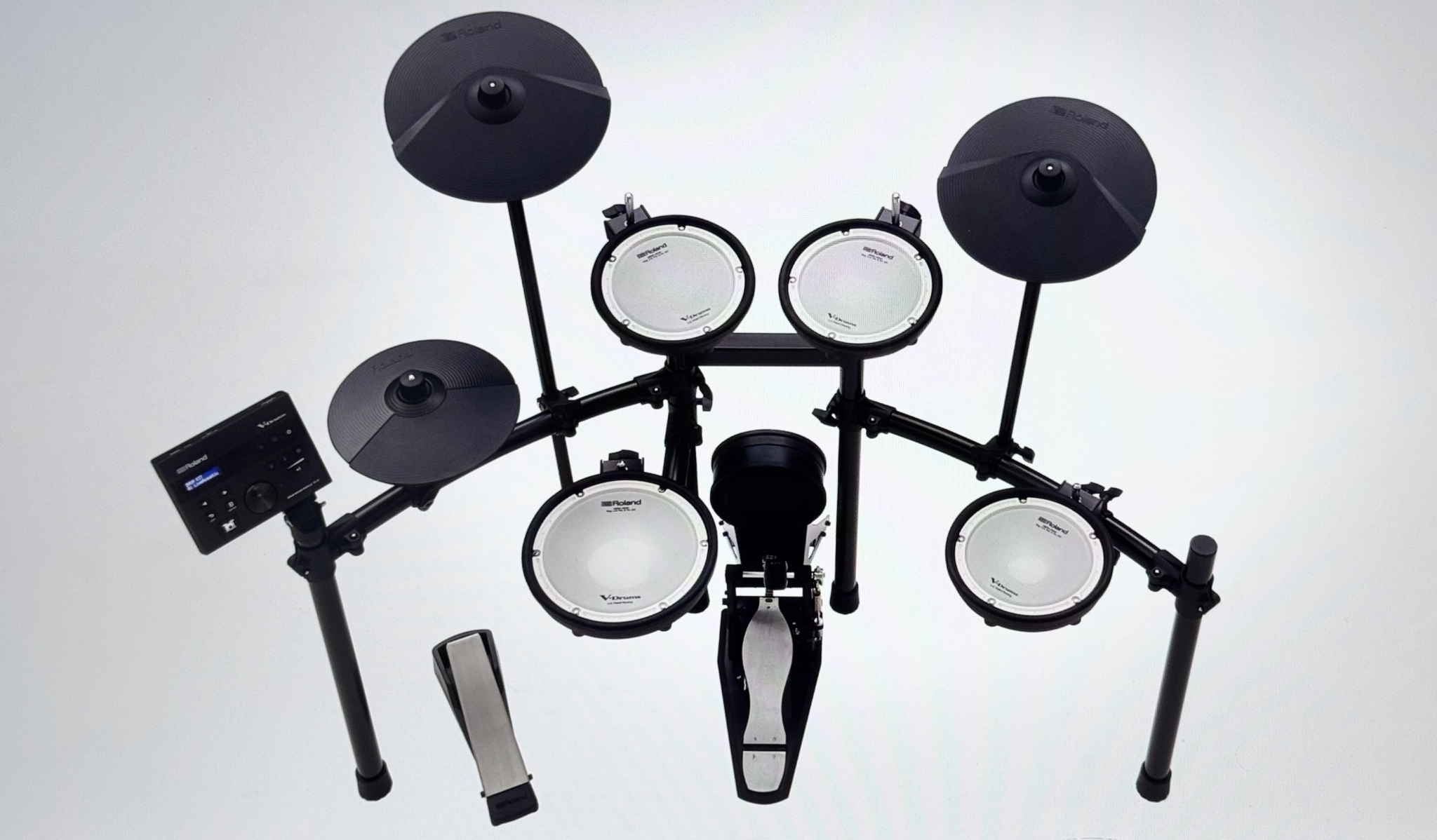 Roland electronic drum kit with a control unit and pedals.