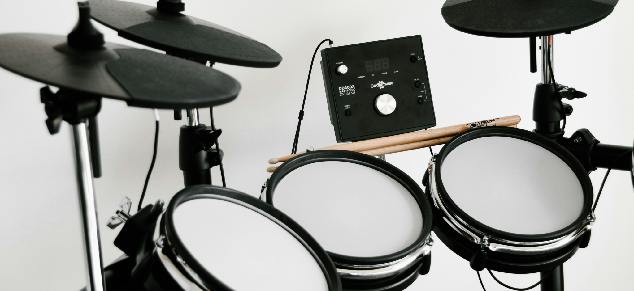 Electronic drum kit with digital interface and drumsticks