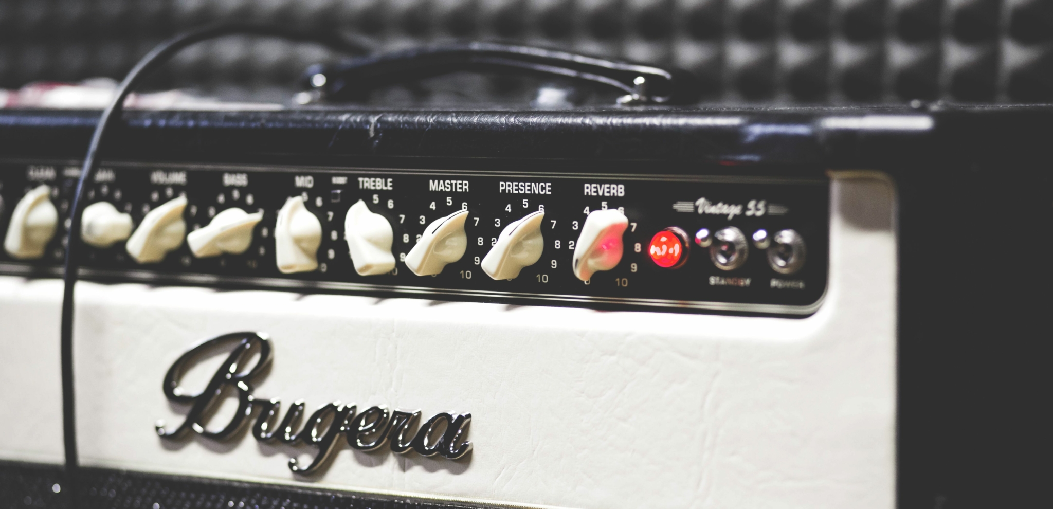 Brugera guitar amplifier head with gain, EQ, master, presence, and reverb controls